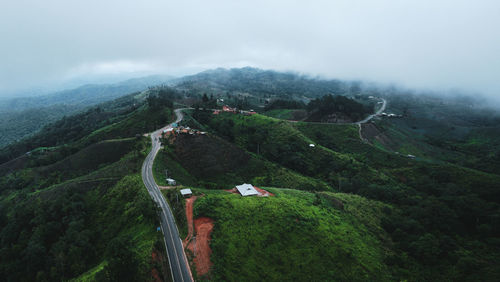 High angle view of road amidst landscape against sky