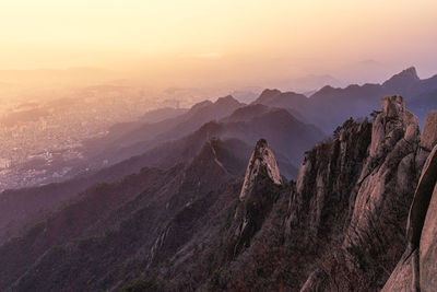 Scenic view of mountains against sky during sunset