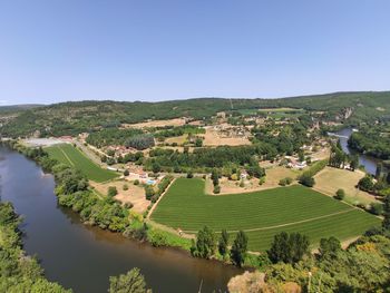 High angle view of agricultural landscape against sky