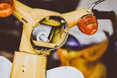 Close-up of damaged motor scooter