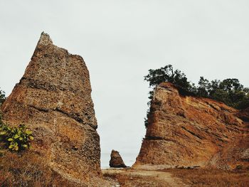 Panoramic view of cliff against clear sky