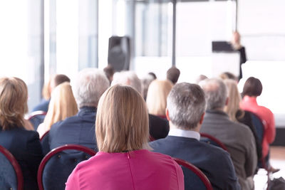 Rear view of people in seminar