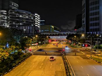 Traffic on city street at night