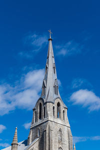 Low angle view of building against blue sky