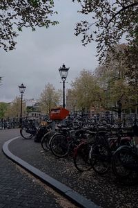 Bicycles on road against sky