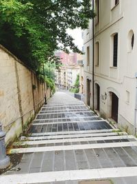 Empty alley amidst buildings