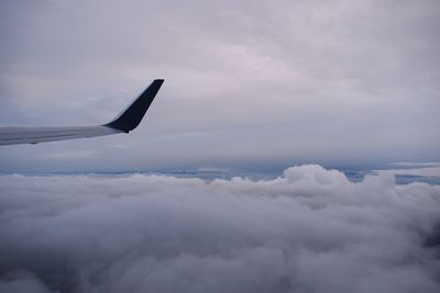 Low angle view of airplane flying in sky