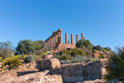 Old ruin building against blue sky