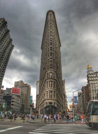 Group of people walking on road in city