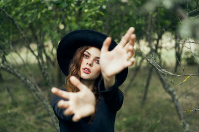 Young woman wearing hat