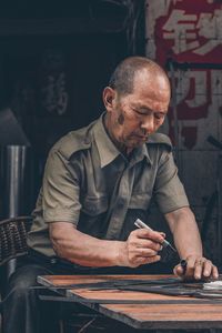 Man working on table