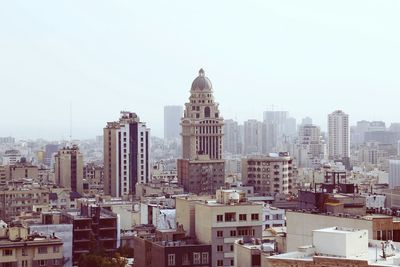 Buildings against clear sky