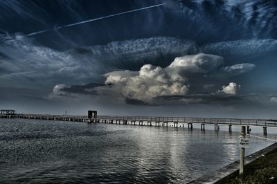 Scenic view of sea against cloudy sky