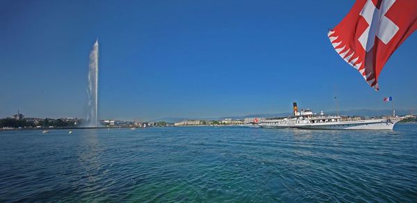 Scenic view of sea against clear blue sky