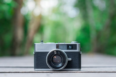 Close-up of camera on table
