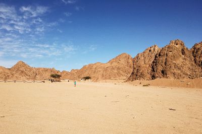 Scenic view of desert against clear sky