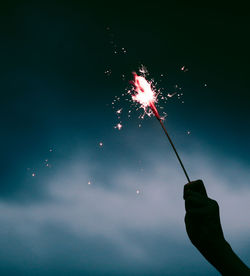 Hand holding sparkler