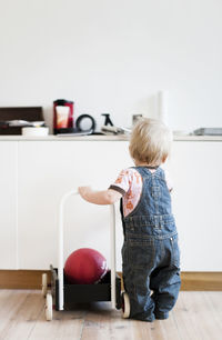 Baby boy playing at home