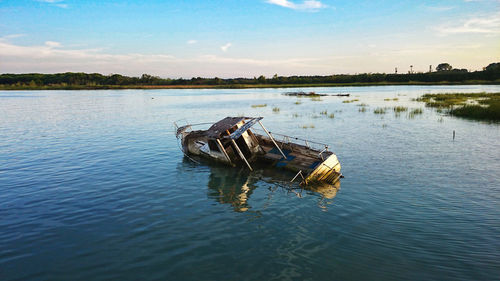 Scenic view of lake against sky