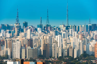 Modern buildings in city against sky