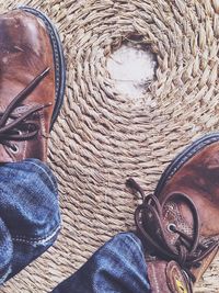 Low section of woman sitting outdoors