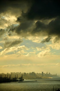 Cloudy sky above sea at sunset