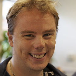 Close-up portrait of smiling young man