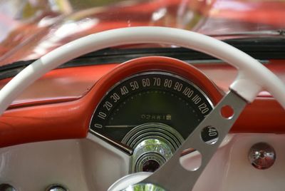 Close-up of red vintage car