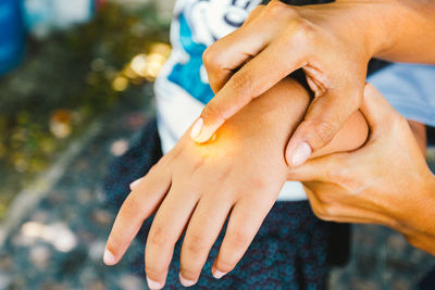 Close-up of couple hands