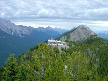 Scenic view of landscape and mountains against sky