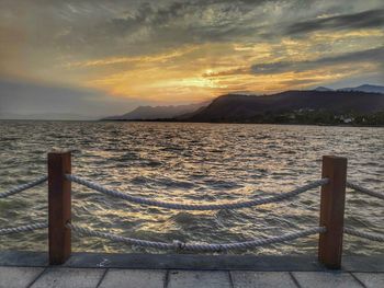 Scenic view of sea against sky during sunset