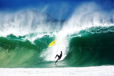 Man surfing in sea