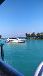 Scenic view of sea against clear blue sky