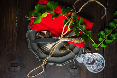 High angle view of red berries on table