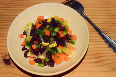 Close-up of fruits in plate on table