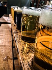 Close-up of beer glass on table