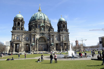 Tourists in front of historic building