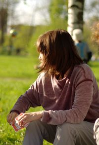 Woman sitting in park