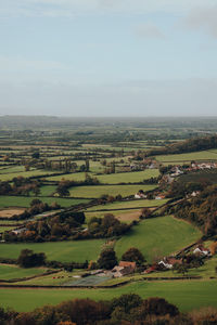 Scenic view of fields and farms from mendip hills, uk, on a sunny autumn day.