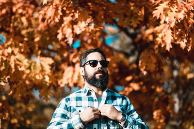 Portrait of young man wearing sunglasses