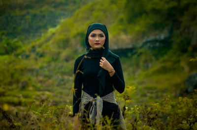 Muslim hiker take a photo with hijab