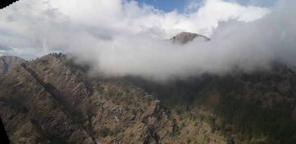 Panoramic view of landscape and mountains against sky