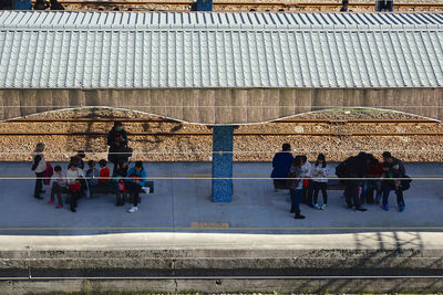 High angle view of people at railroad station platform