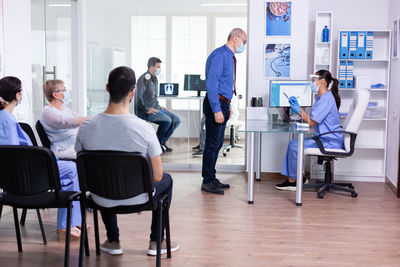 Group of business people working in office