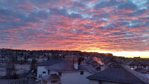 High angle view of town against cloudy sky