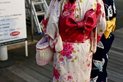 Close-up of baby girl with text