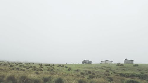 Built structure on field against clear sky