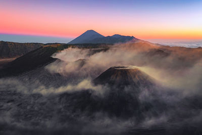 View of volcanic mountain during sunset