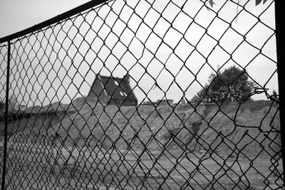 Low angle view of chainlink fence