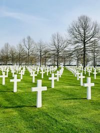 Row of cemetery against sky